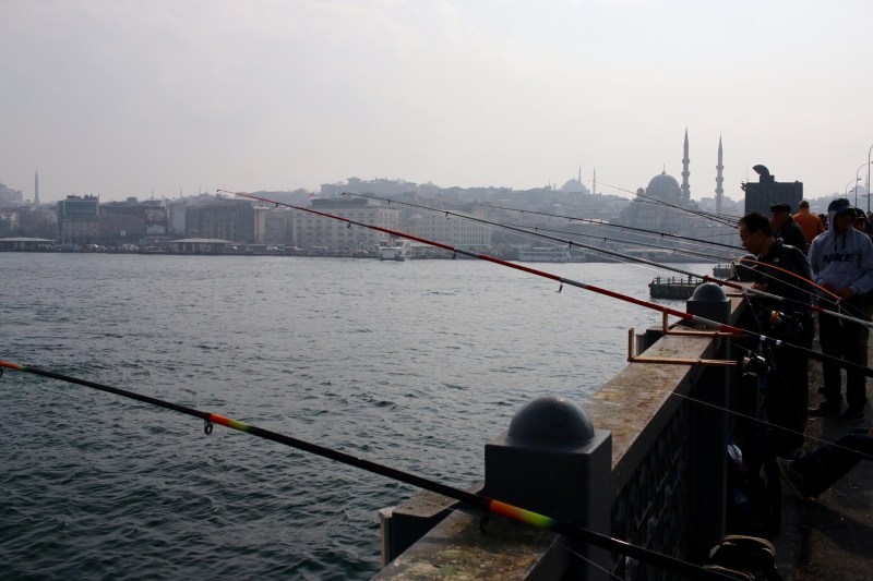 Fishermen on the bridge